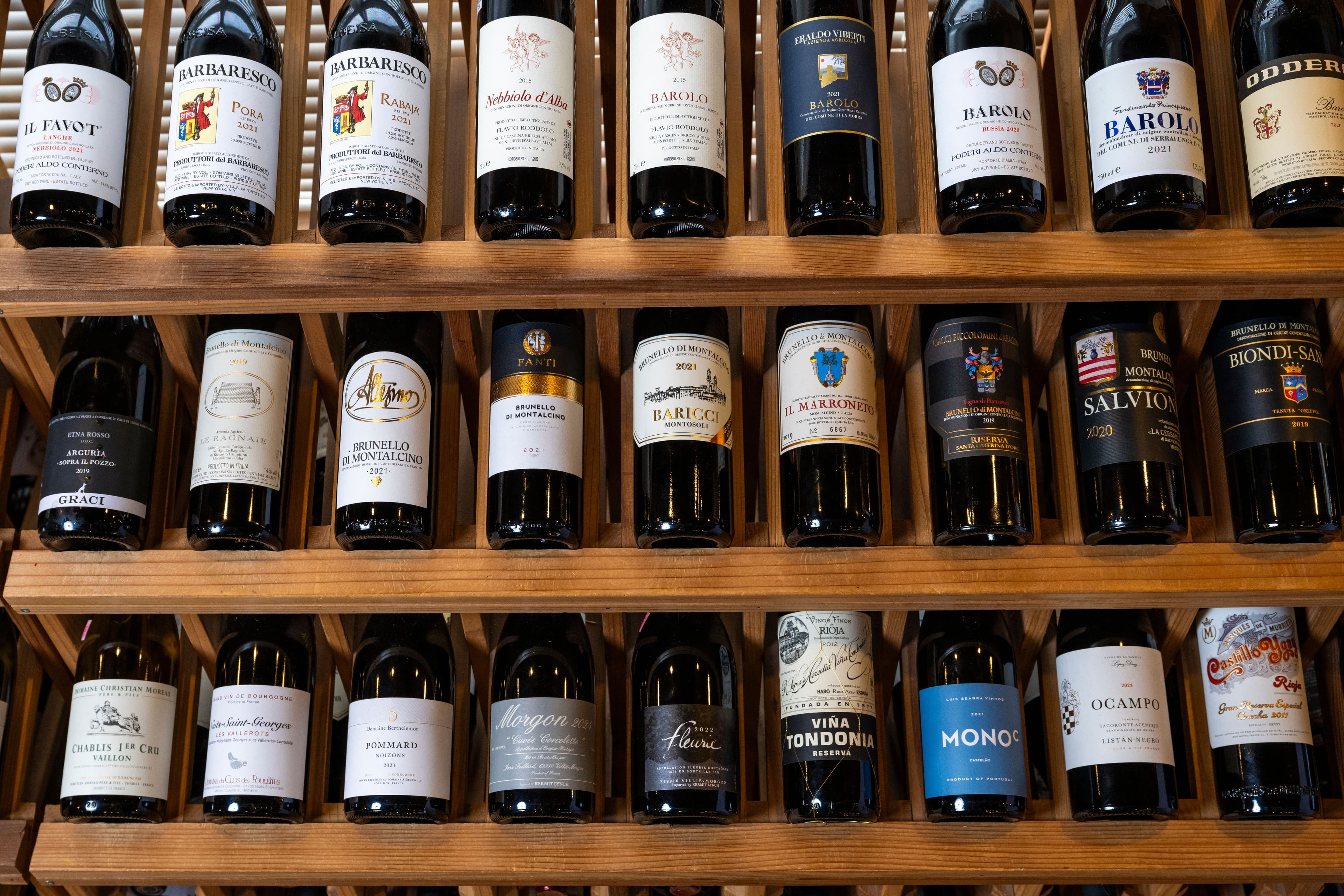 The wall of bottles inside The Clown, our wine and spirits shop on US Route 1 in York, Maine